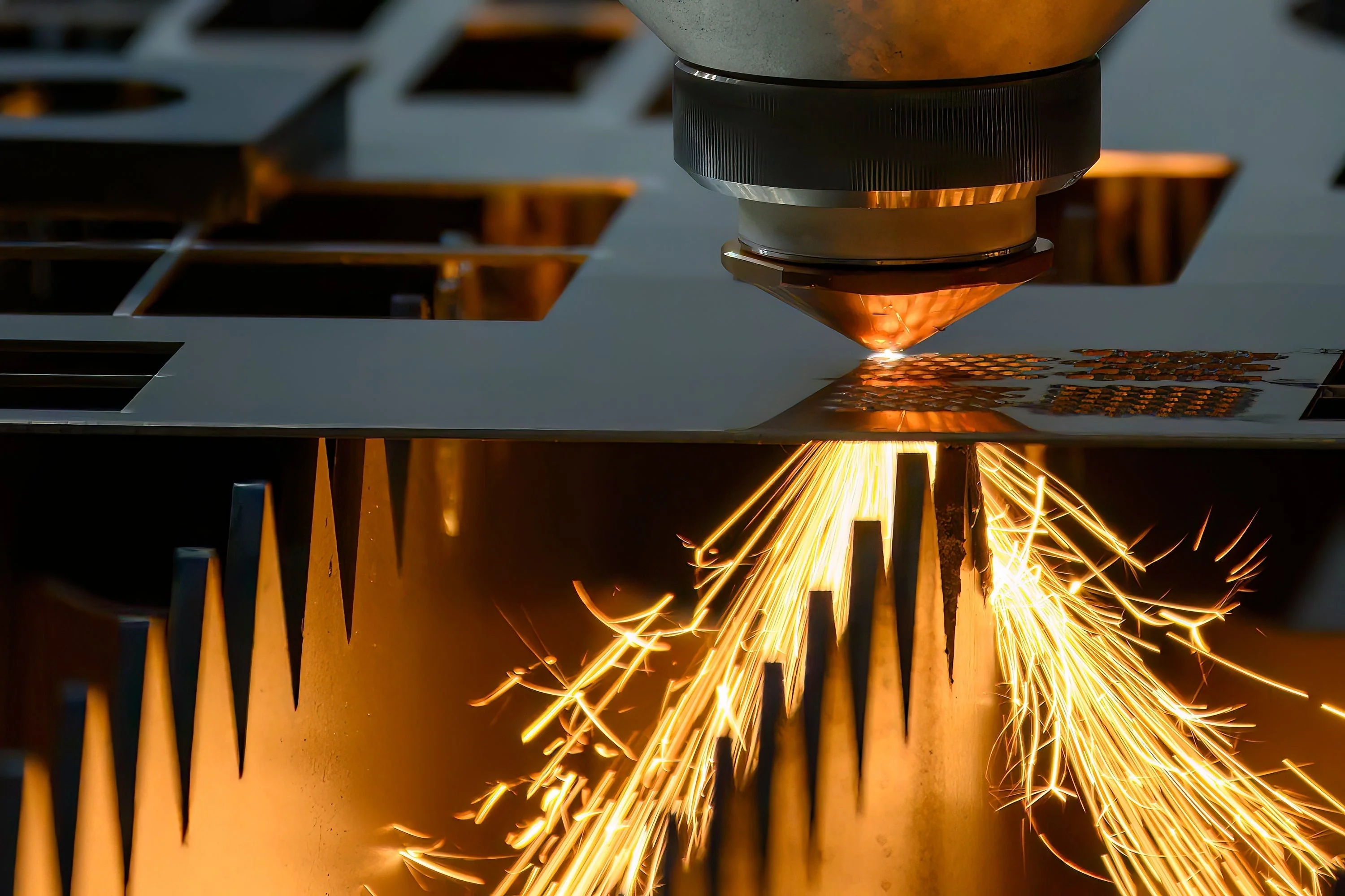 Industrial laser cutting machine in action